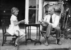 Patience Thompson playing cards with her Father, Sir Lawrence Bragg